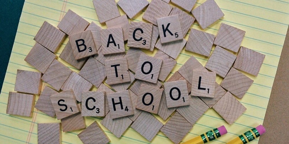 Back to school spelt out with scrabble pieces