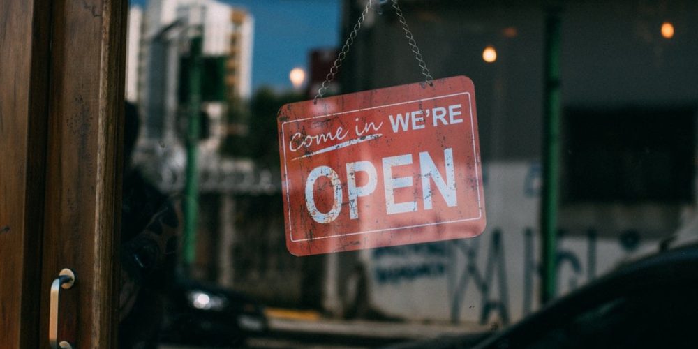 Glass door with open sign